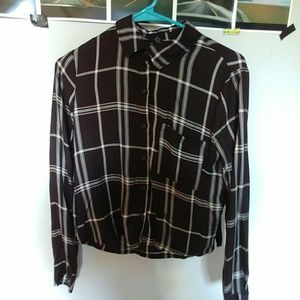 A plaid button up shirt.